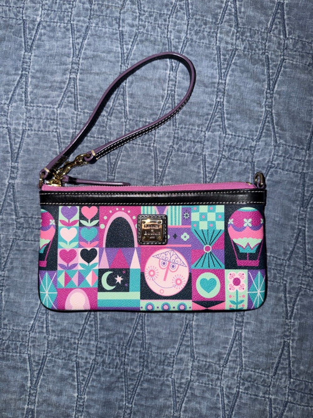 dooney & bourke Its a small world disney wristlet wallet